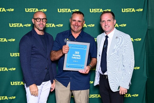 The City of Cape Coral accepts the Outstanding Facility Award from the United States Tennis Association.
